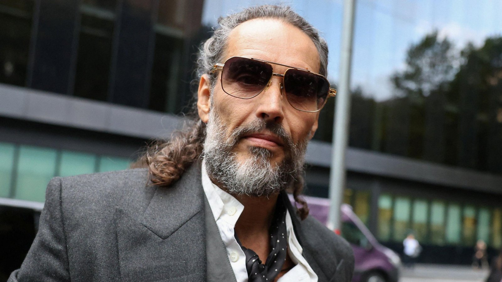 Russell Brand Accuser Tells Court He Turned “Monster-Like” Before Alleged Rape